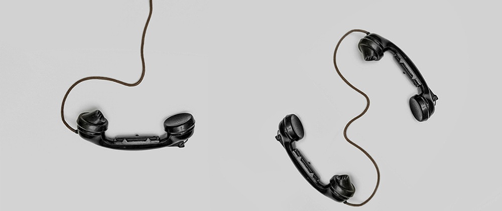 Vintage telephone handsets representing communication