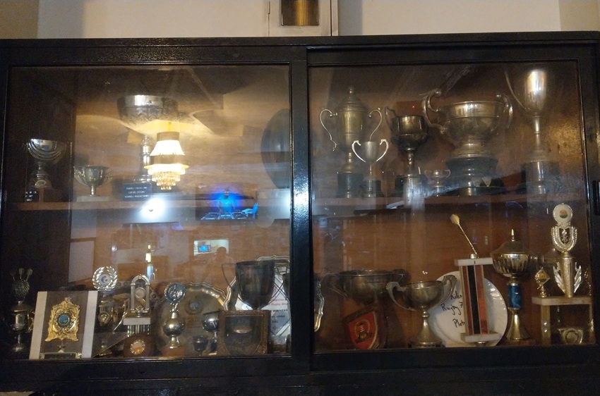 Trophy cabinet displaying Nakuru Athletic Club's awards and achievements